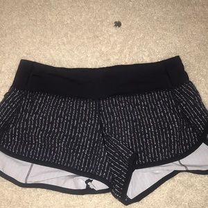 black lulu shorts with writing
